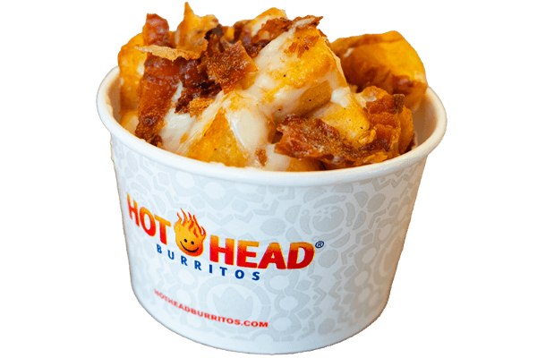 Potatoes loaded with queso and bacon